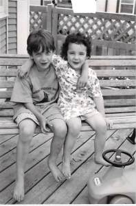 Luke, with little Dev on the deck at Irving house